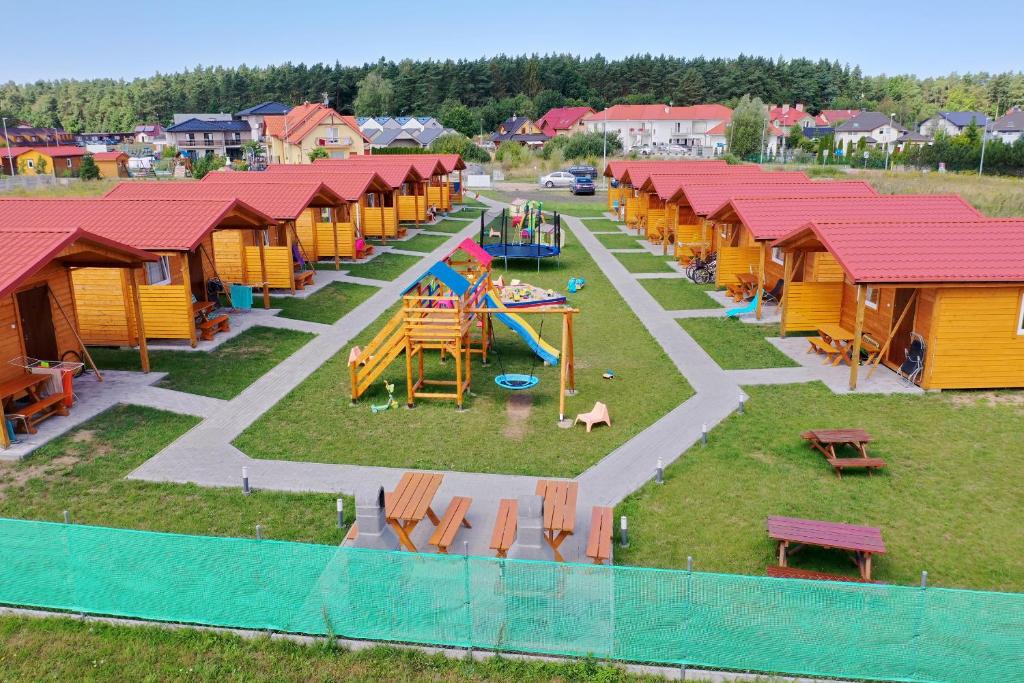 an overhead view of a park with a playground at Domki Milka in Ustka