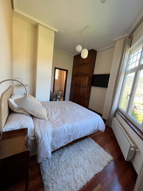 Postel nebo postele na pokoji v ubytování Haizea