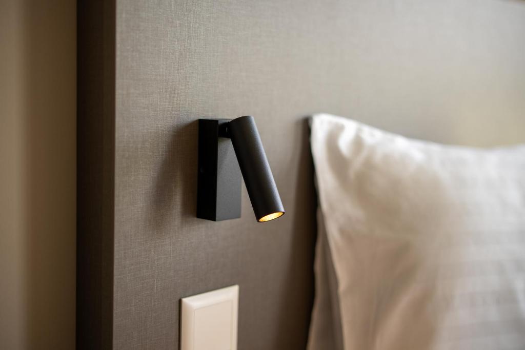 Postel nebo postele na pokoji v ubytování b-smart motel Schaan