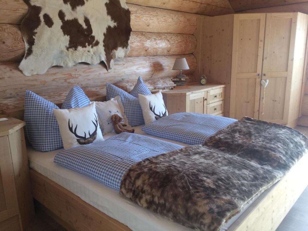 Voodi või voodid majutusasutuse Holzberghof toas