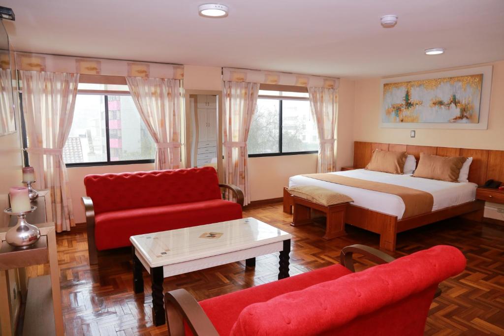 Postel nebo postele na pokoji v ubytování Hotel Carolina Montecarlo