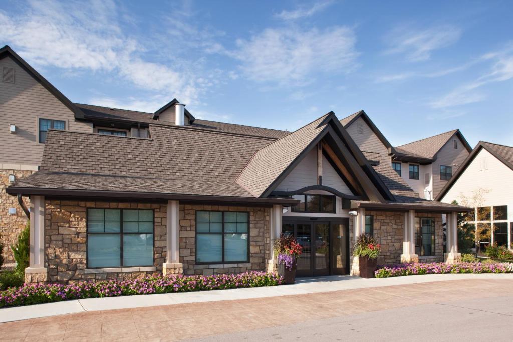 a house with a roof at Residence Inn by Marriott Lincoln South in Lincoln