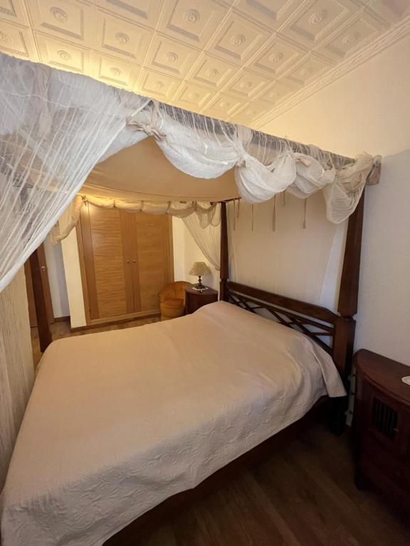 Postel nebo postele na pokoji v ubytování Casa Bimba