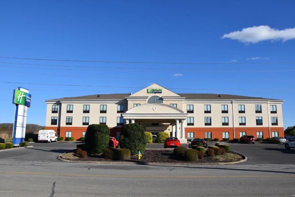 a hotel building with a parking lot in front of it at Holiday Inn Express Athens, an IHG Hotel in Athens