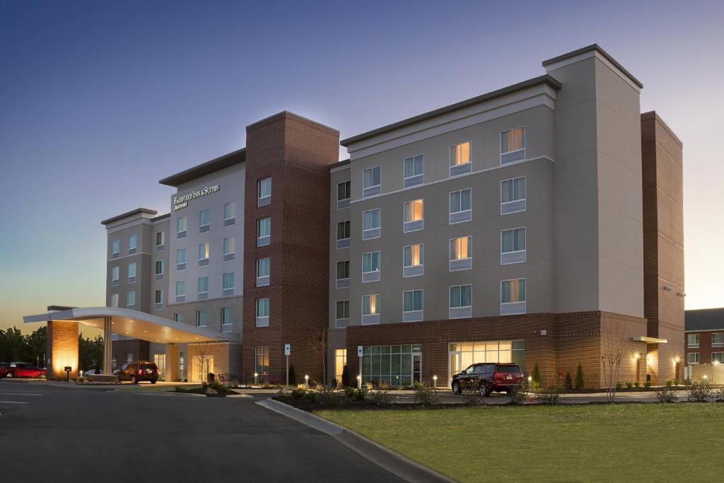 a large building with a parking lot in front of it at Fairfield Inn & Suites by Marriott Rock Hill in Rock Hill