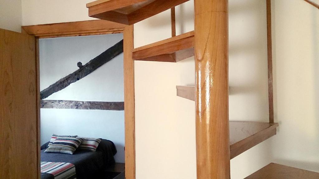 Palanda nebo palandy na pokoji v ubytování La Casita Camponaraya