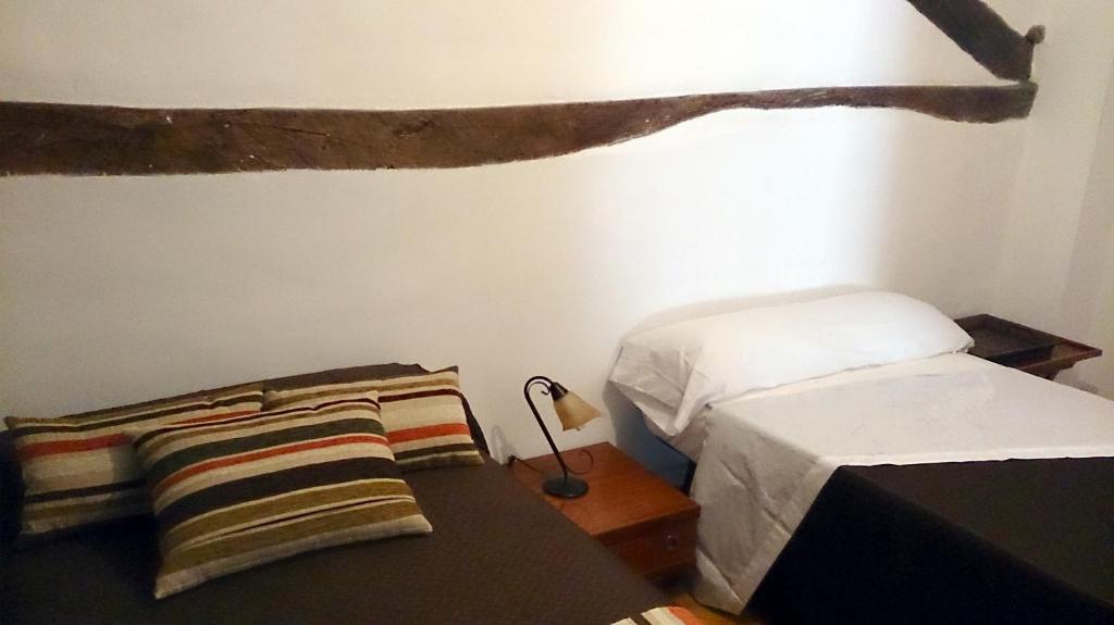 Postel nebo postele na pokoji v ubytování La Casita Camponaraya