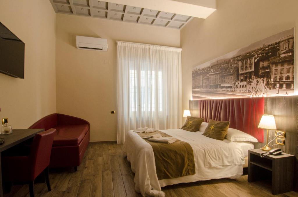 Postel nebo postele na pokoji v ubytování Hotel Maria