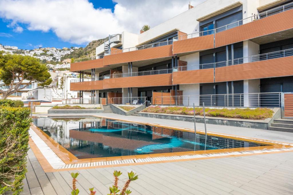 Bazén v ubytovaní NC APARTMENTS Moli Blau 102 - 4 personas alebo v jeho blízkosti