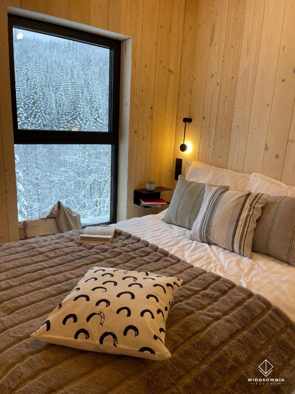 Postel nebo postele na pokoji v ubytování Widokownia Brenna