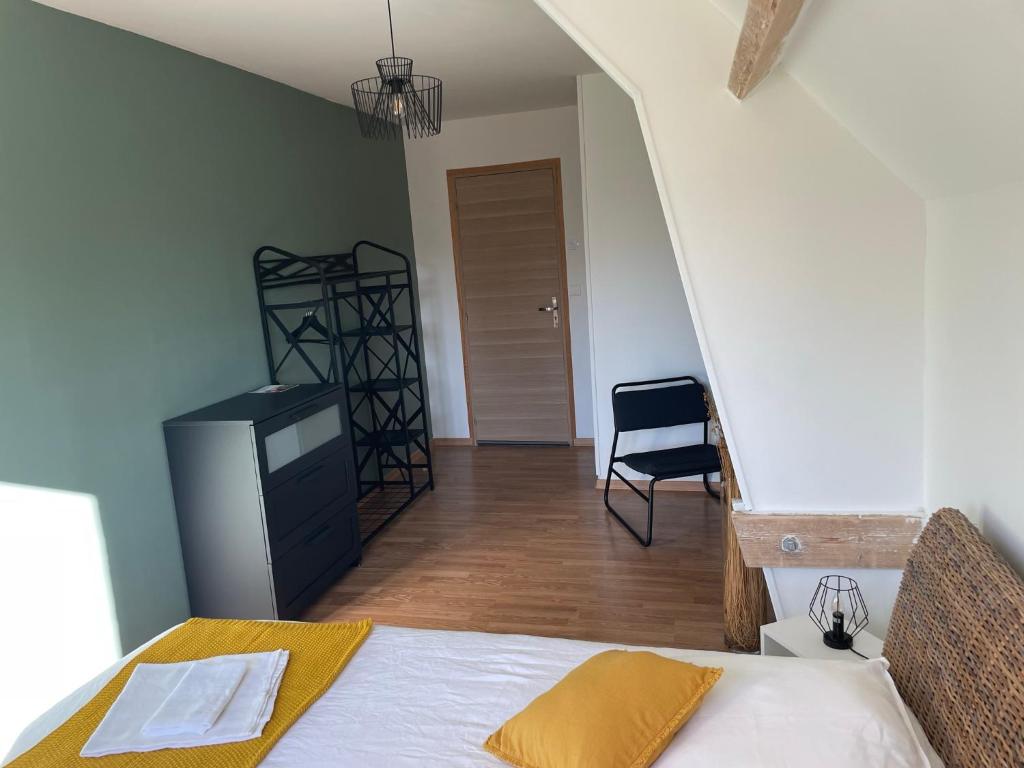 Postel nebo postele na pokoji v ubytování Le Vrai Paradis