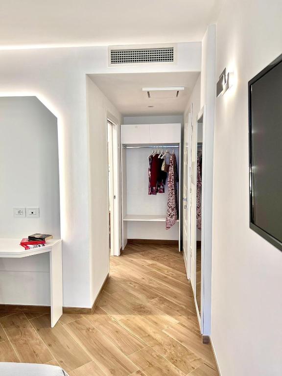 A television and/or entertainment centre at Tropea Il Tridente Accommodations