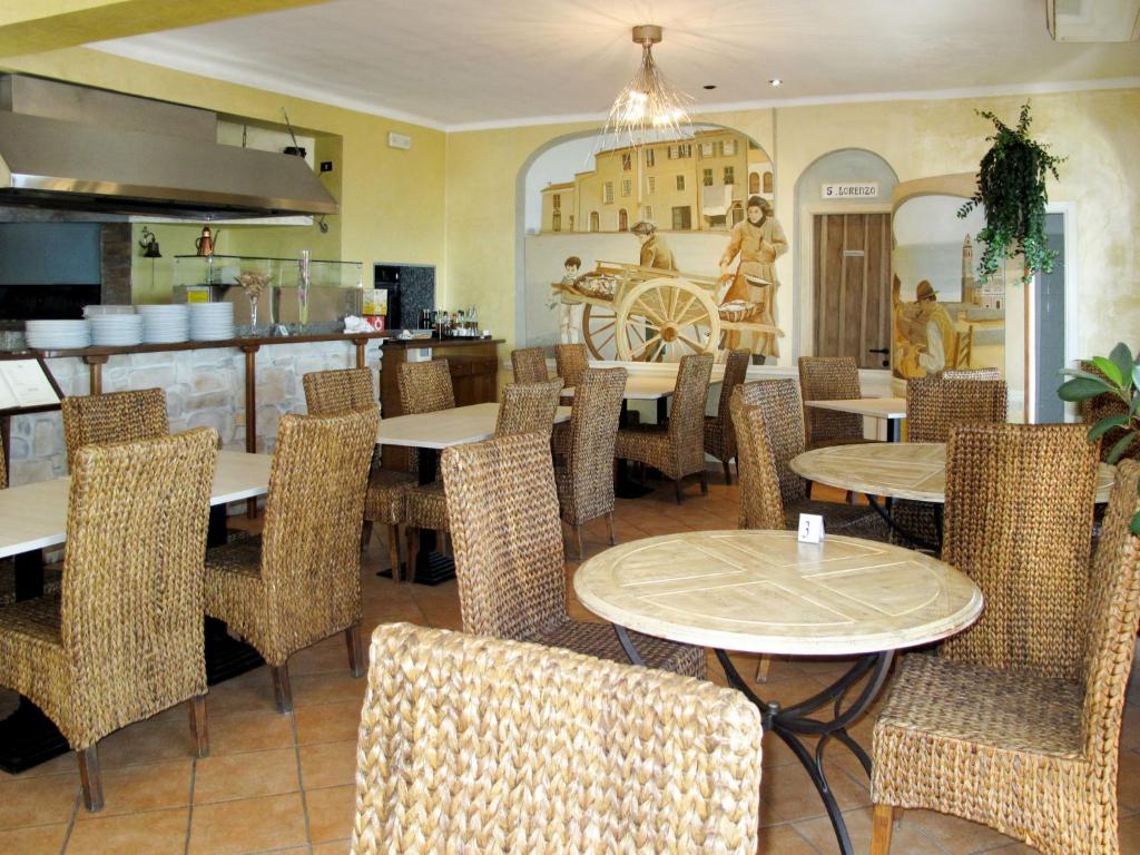 A seating area at Holiday Home Mandorlo - SLR401 by Interhome