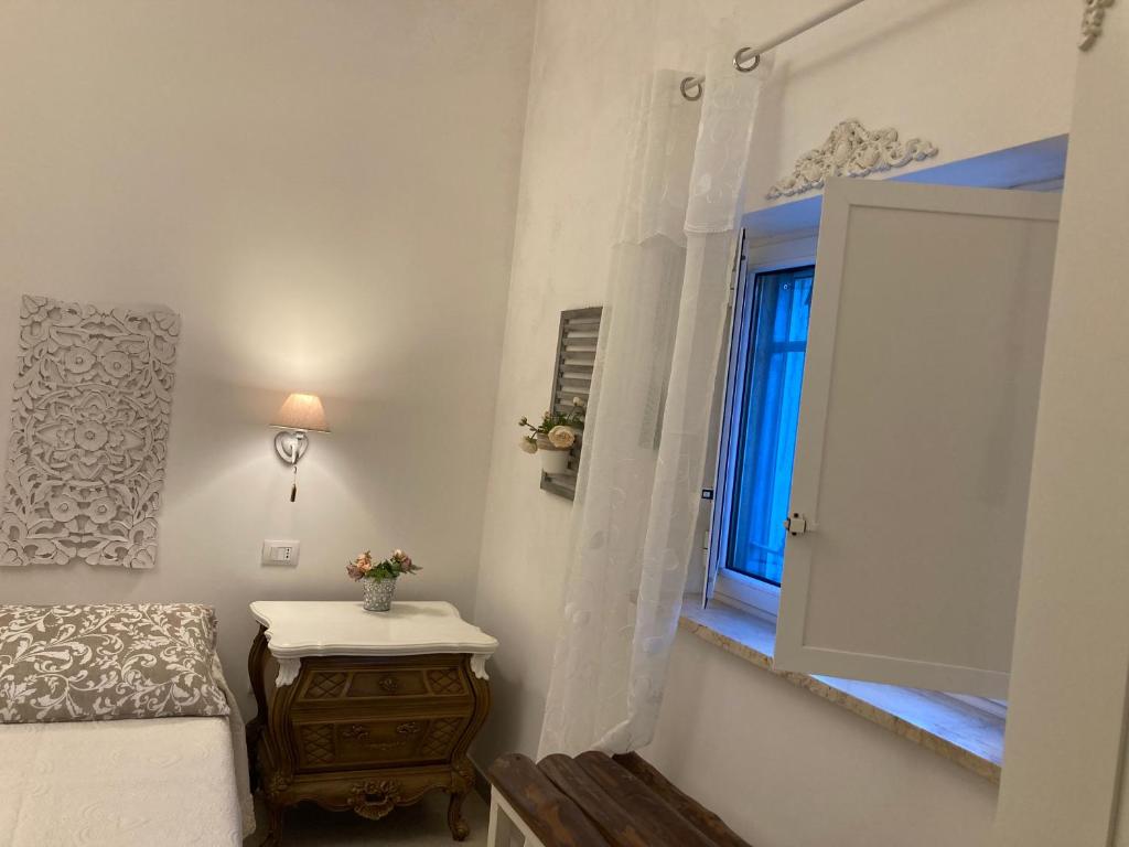 Postel nebo postele na pokoji v ubytování Il Casale Di Brunella