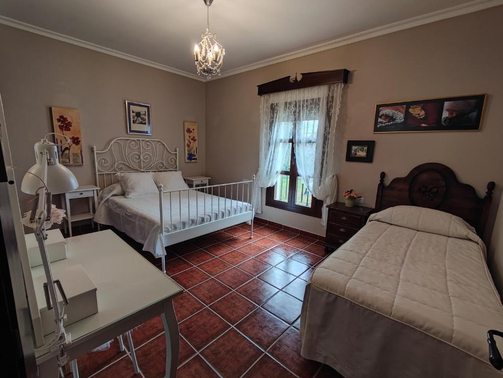 Postel nebo postele na pokoji v ubytování Villa Encanto