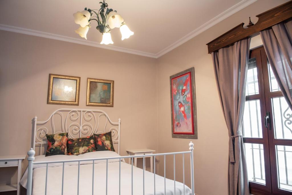 Postel nebo postele na pokoji v ubytování Villa Encanto