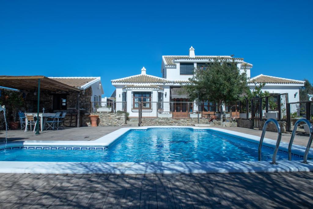 Bazén v ubytování Villa Encanto nebo v jeho okolí