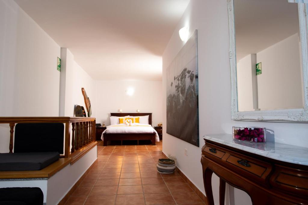 Postel nebo postele na pokoji v ubytování Geko Hotels