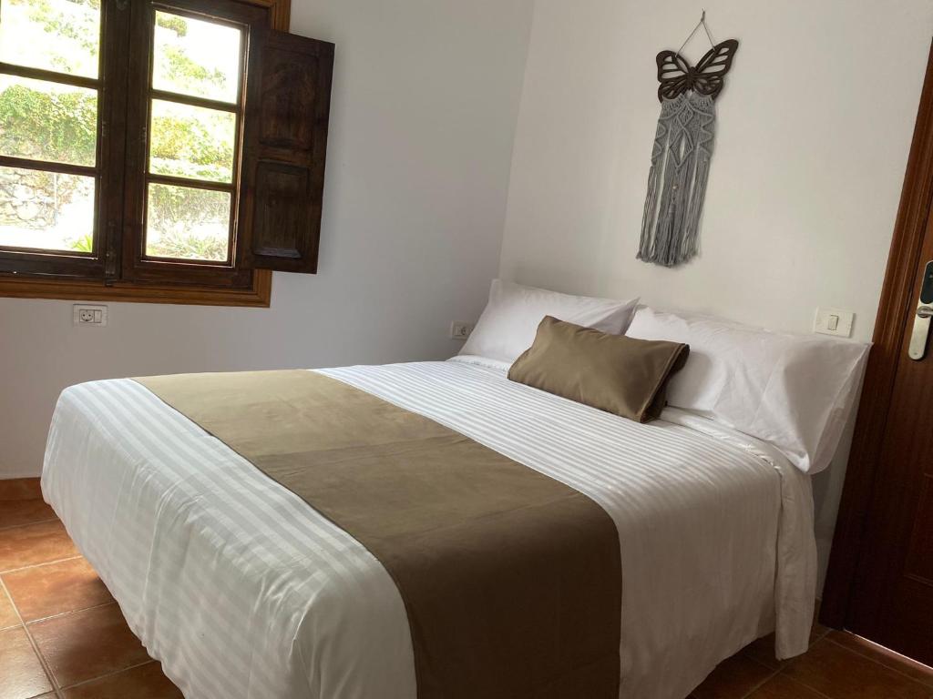 Postel nebo postele na pokoji v ubytování Geko Hotels