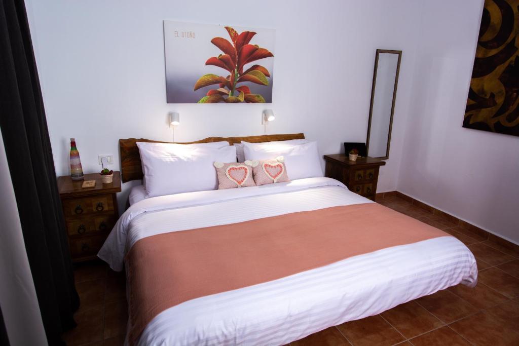 Postel nebo postele na pokoji v ubytování Geko Hotels
