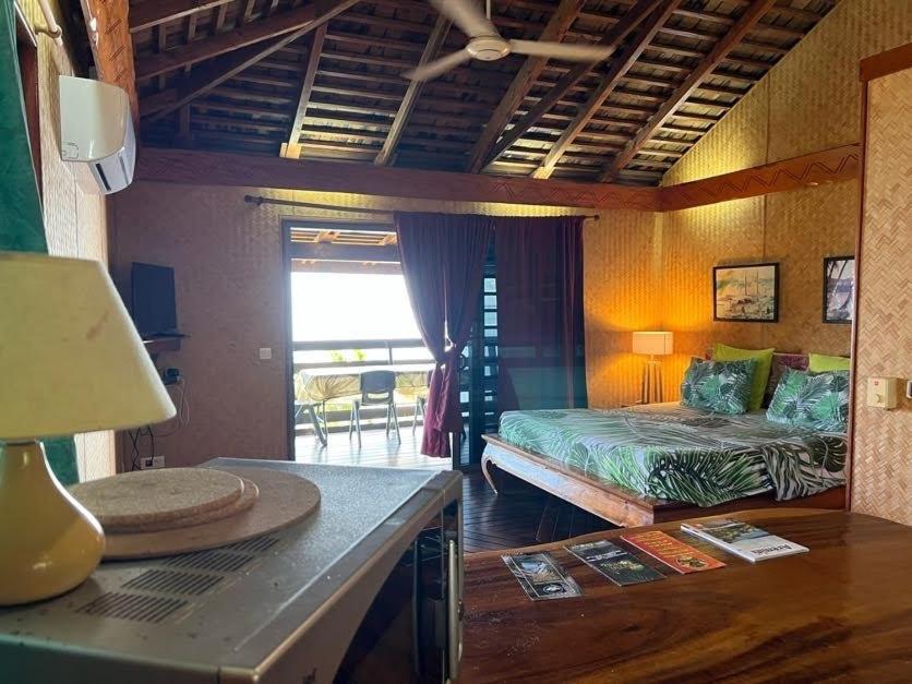 Postel nebo postele na pokoji v ubytování Tehuarupe Surf Studios