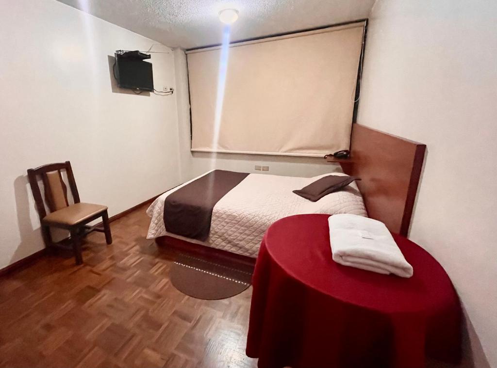 Postel nebo postele na pokoji v ubytování Hotel Bacastell