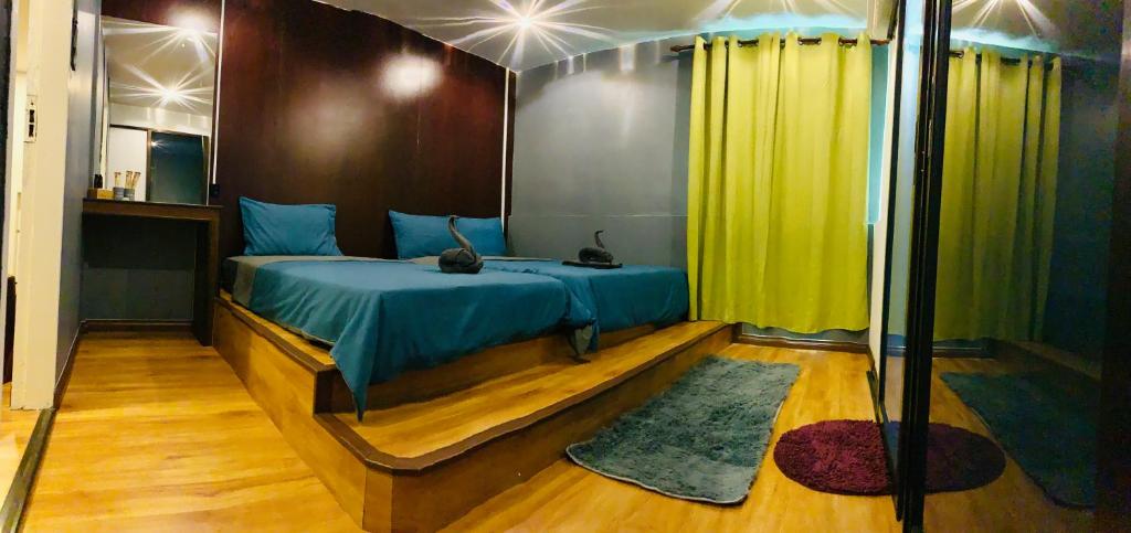 Postel nebo postele na pokoji v ubytování bamboo homestay M2 小竹林 仙本那 榻榻米独栋房源六间房间独立卫生浴 步行码头十分钟