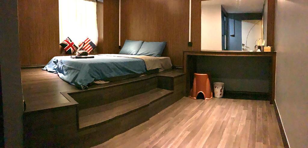 Postel nebo postele na pokoji v ubytování bamboo homestay M2 小竹林 仙本那 榻榻米独栋房源六间房间独立卫生浴 步行码头十分钟
