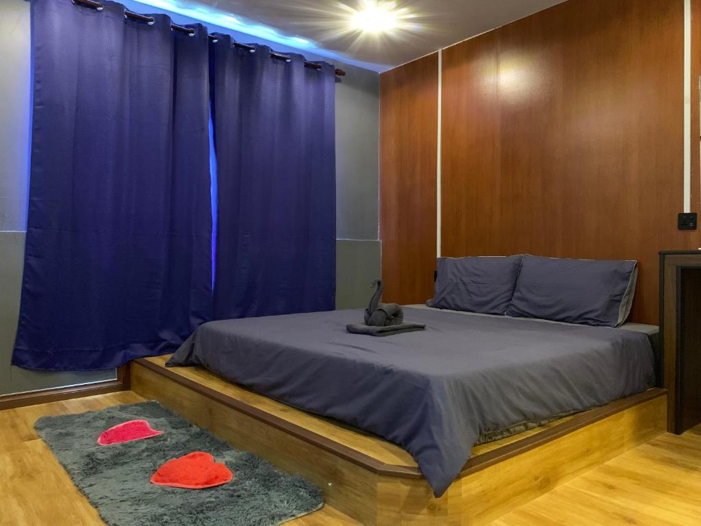 Postel nebo postele na pokoji v ubytování bamboo homestay M2 小竹林 仙本那 榻榻米独栋房源六间房间独立卫生浴 步行码头十分钟