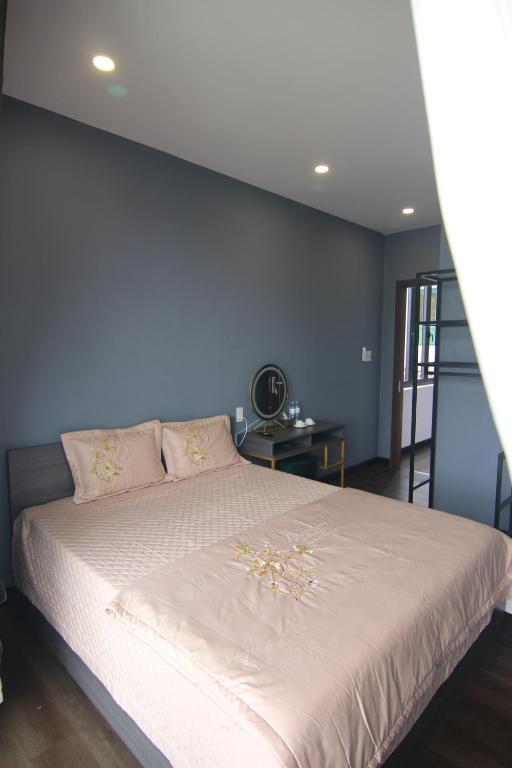 Giường trong phòng chung tại Dory Homestay