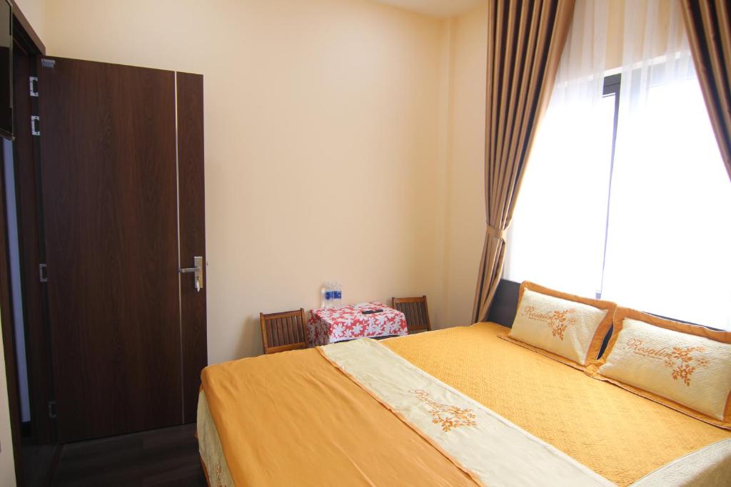 Giường trong phòng chung tại Dory Homestay