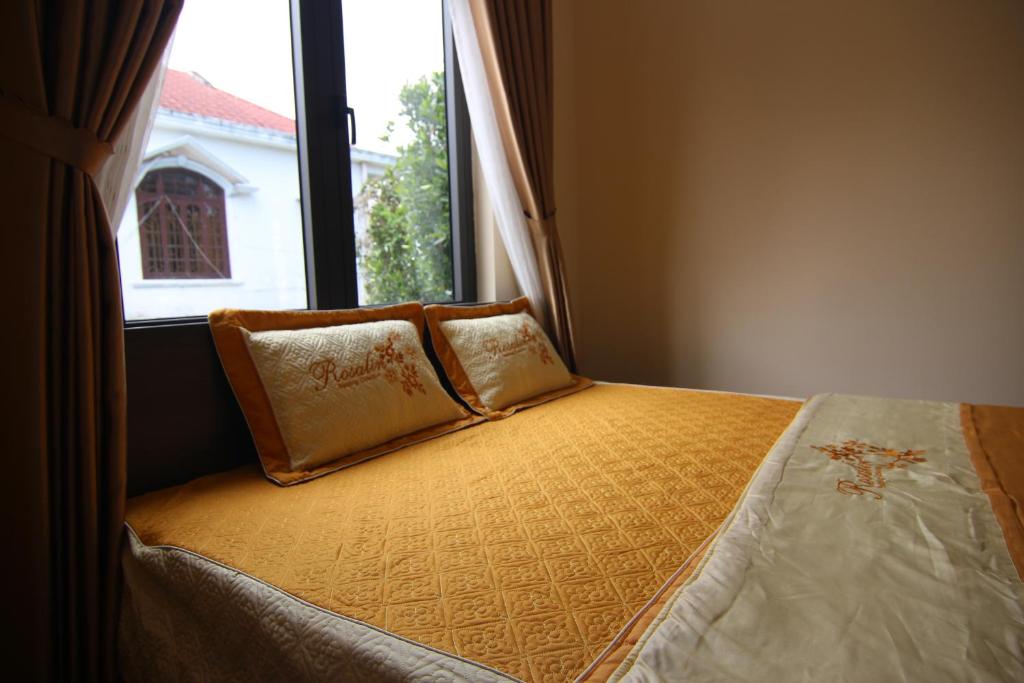 Giường trong phòng chung tại Dory Homestay