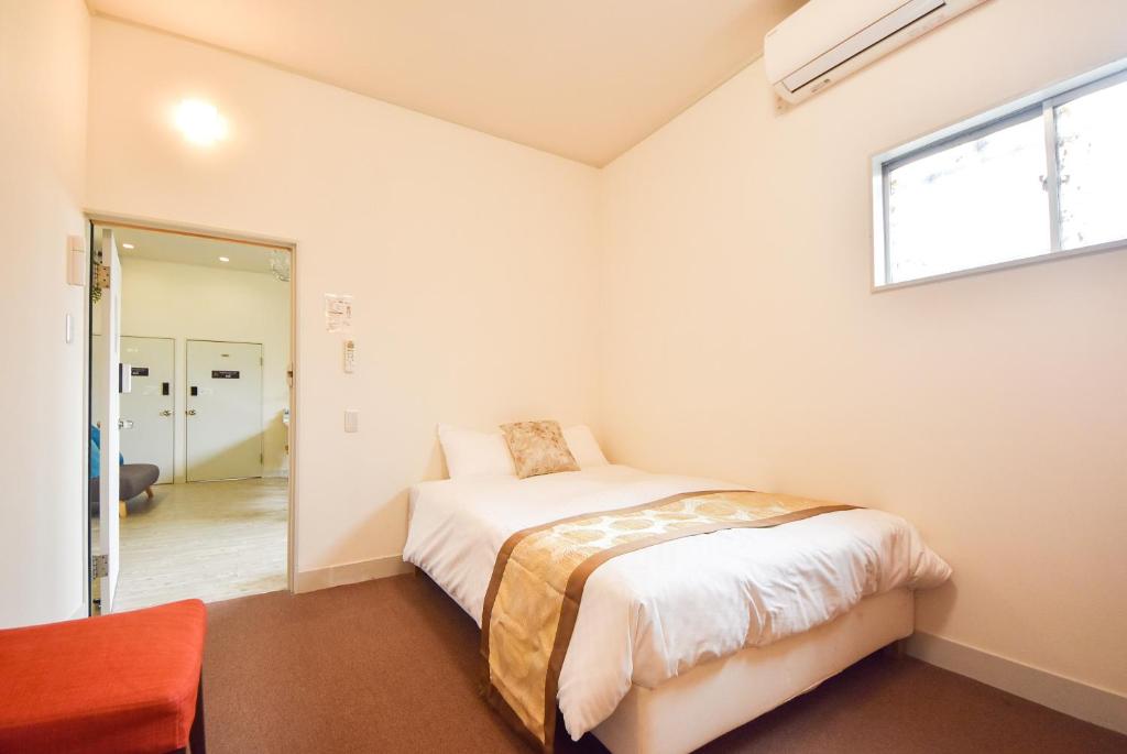 Letto o letti in una camera di Comfy Stay Sarusawaike