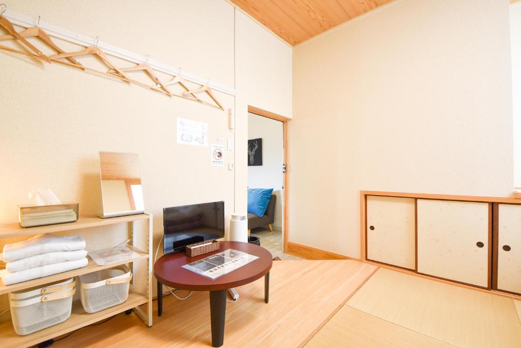 TV o dispositivi per l'intrattenimento presso Comfy Stay Sarusawaike