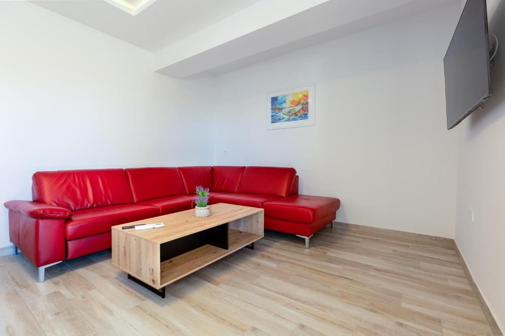 Televízia a/alebo spoločenská miestnosť v ubytovaní Ferienhaus Relax - beheizter - heated Pool