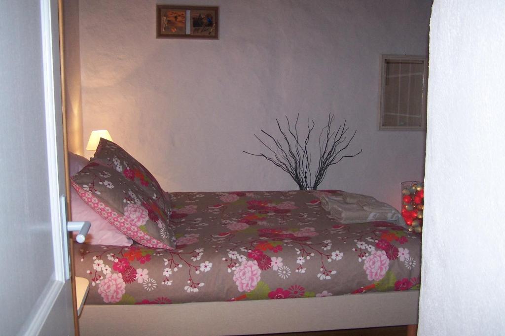 Postel nebo postele na pokoji v ubytování Salomony Chambre d'Hôtes