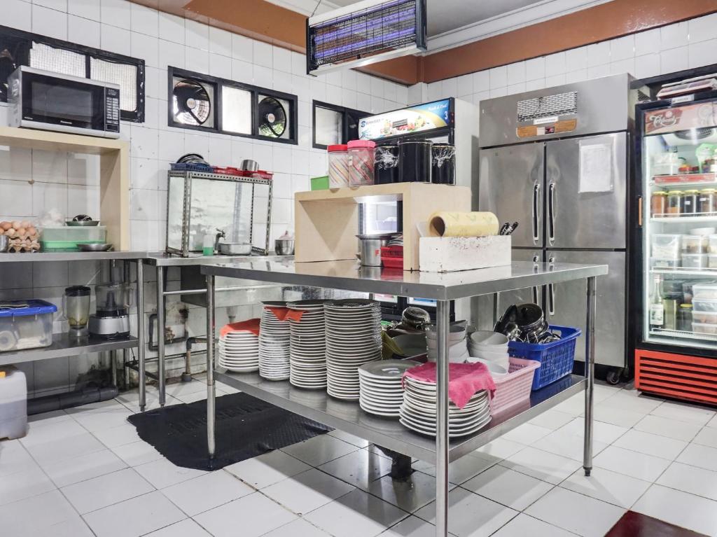 Kuchyň nebo kuchyňský kout v ubytování BI Executive Hotel