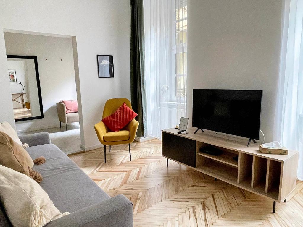 Televízia a/alebo spoločenská miestnosť v ubytovaní Venus Apartments - King Street IV