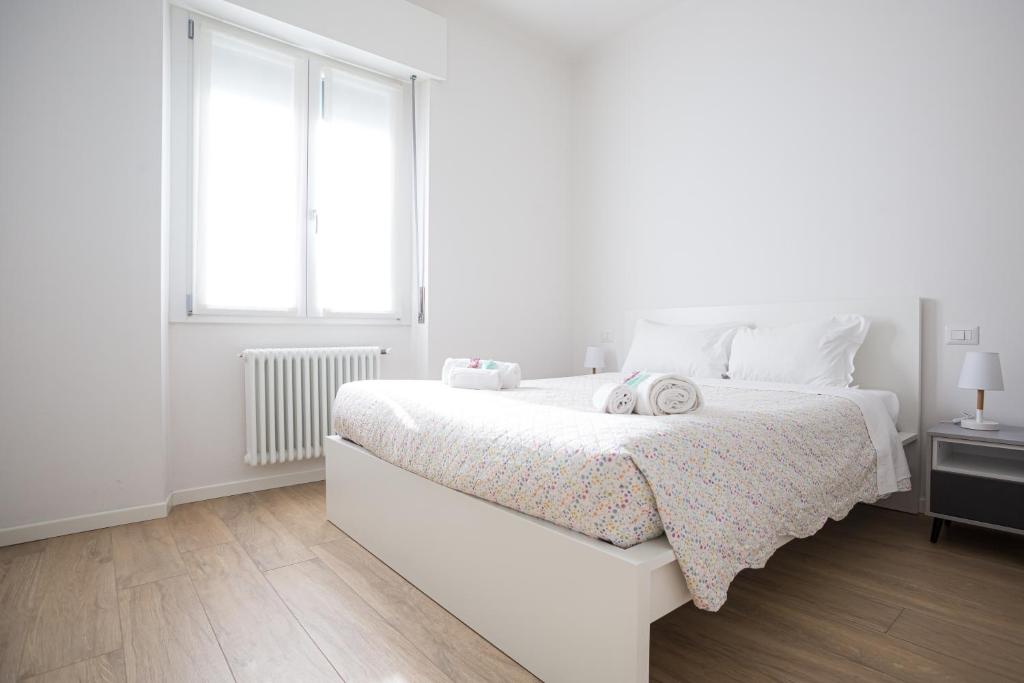 Łóżko lub łóżka w pokoju w obiekcie Eli Home - Royal Welcome