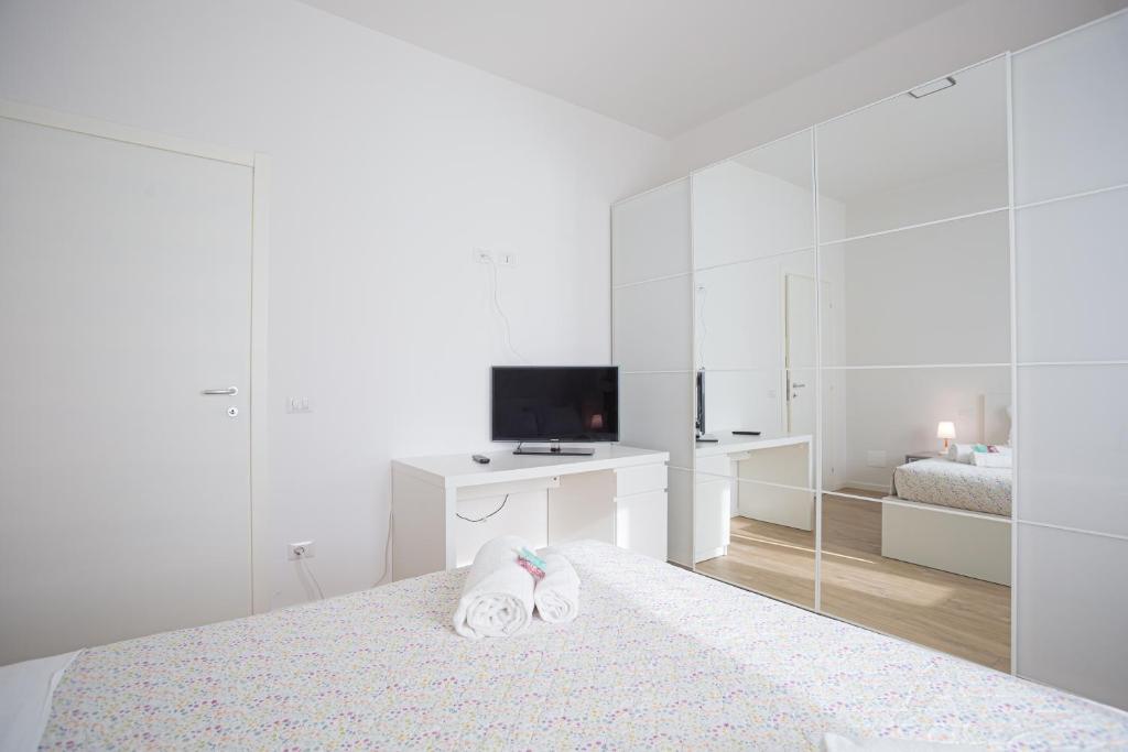 Łóżko lub łóżka w pokoju w obiekcie Eli Home - Royal Welcome