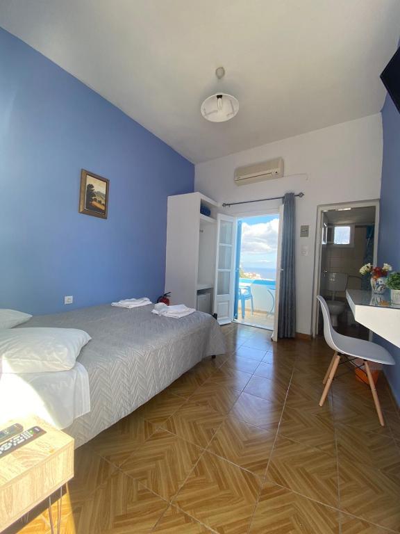 Uma cama ou camas num quarto em Stella Nomikou Apartments