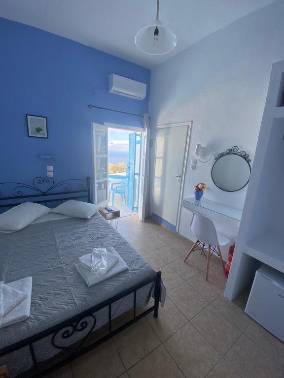 Uma cama ou camas num quarto em Stella Nomikou Apartments