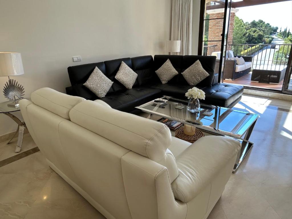 Posezení v ubytování Penthouse Karina Los Arqueros
