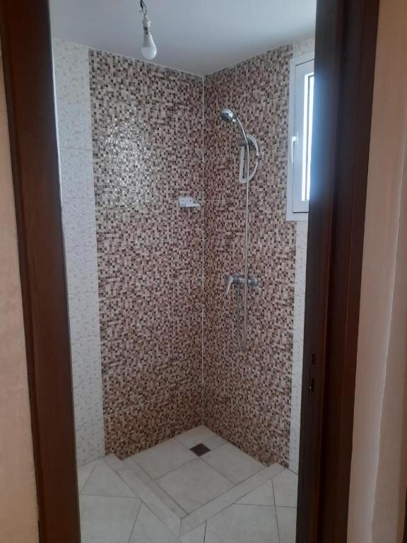 Ванная комната в IBRAHIM BOUHOU