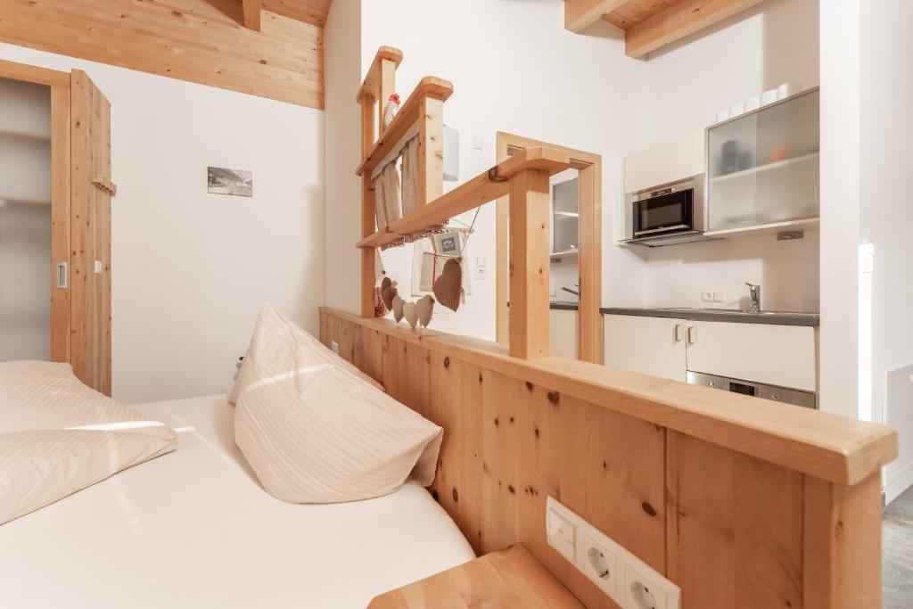 Postel nebo postele na pokoji v ubytování Aparthotel Ambiente