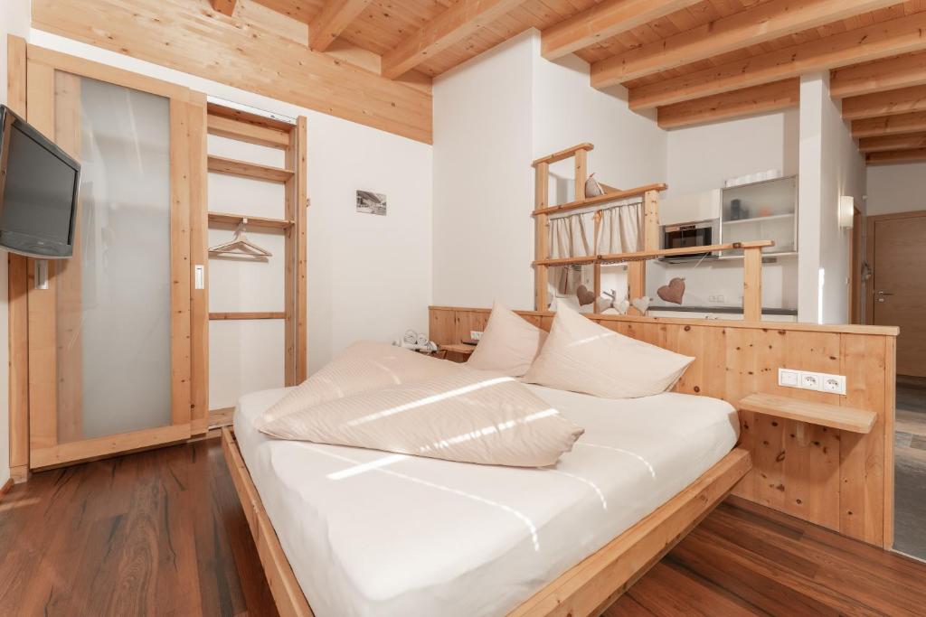 Postel nebo postele na pokoji v ubytování Aparthotel Ambiente