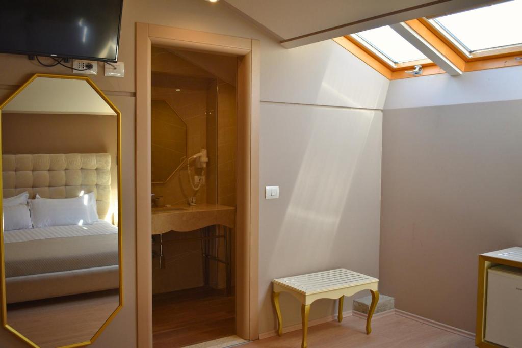 Letto o letti in una camera di Hotel Rezidenca Desaret