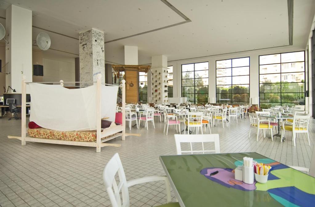 A restaurant or other place to eat at The Marmara Antalya