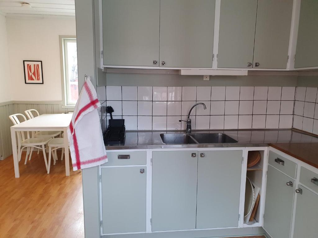 Kuchyň nebo kuchyňský kout v ubytování Epokgården