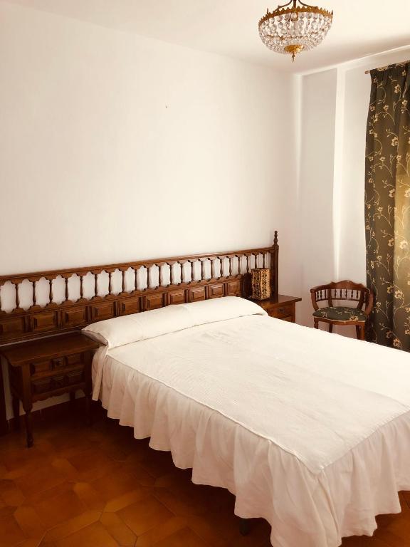 Postel nebo postele na pokoji v ubytování Vivienda Familiar en el Centro de Baeza